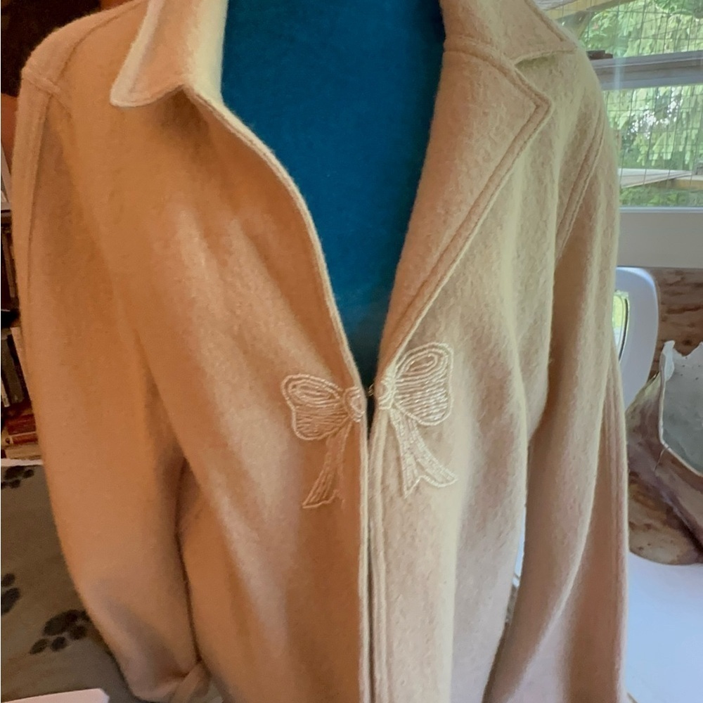 Alfred Dunner 100% wool- 
Front closed with hook and has a bow of shiny beads